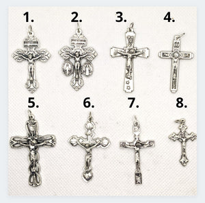8 crucifix options are shown on a white background 