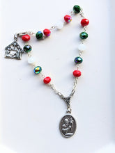 Load image into Gallery viewer, The red, green and white Christmas style St Andrew Novena Chaplet sits on a white background. 